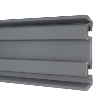 A horizontal close-up shot of a gray, plastic-looking profile. The profile has multiple grooves and ridges, and a jagged cross-section visible on the right side.