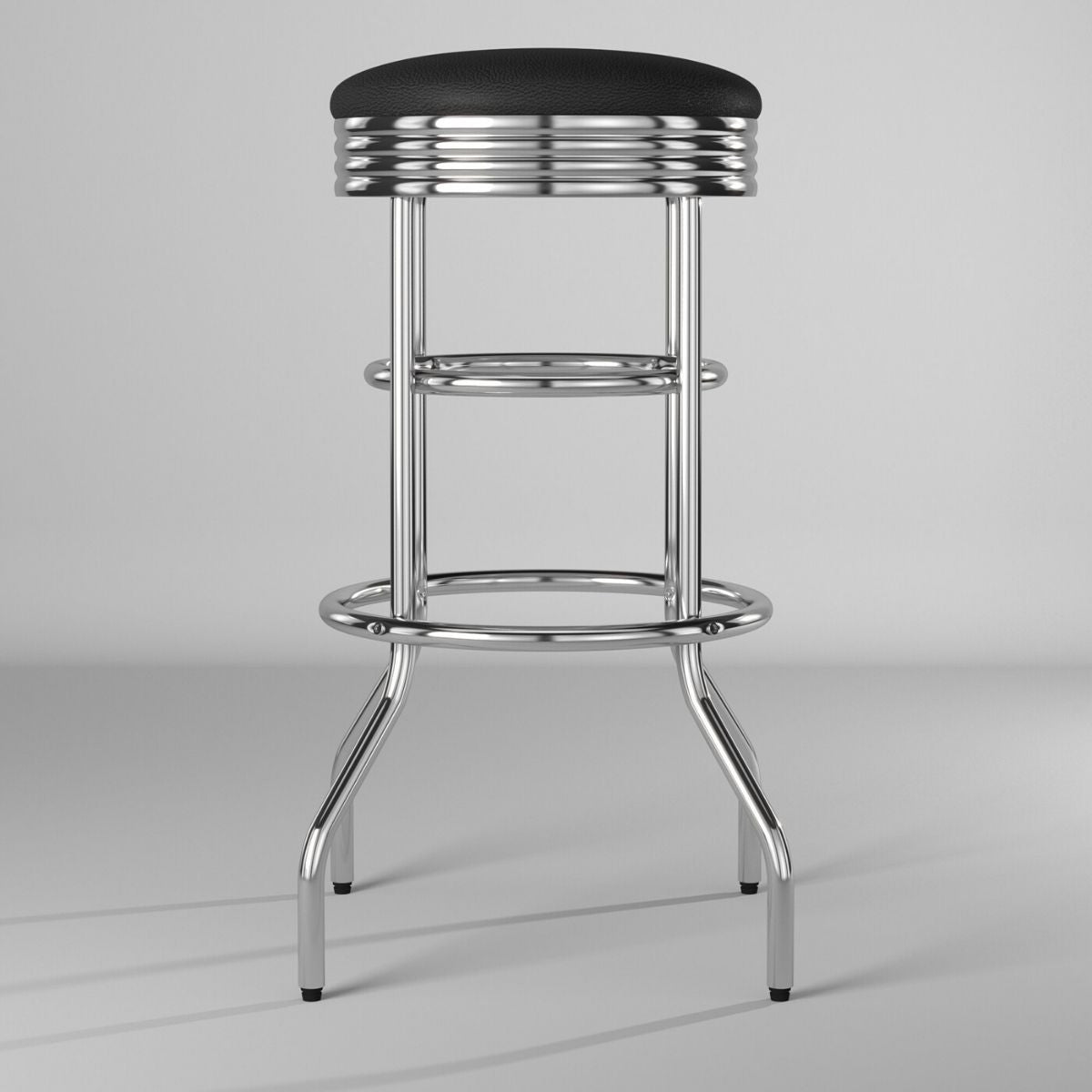 A retro-style chrome bar stool is positioned centrally against a plain gray background. The stool features a black, padded swivel seat with horizontal chrome banding, supported by a polished chrome frame with two circular footrests and four flared legs.