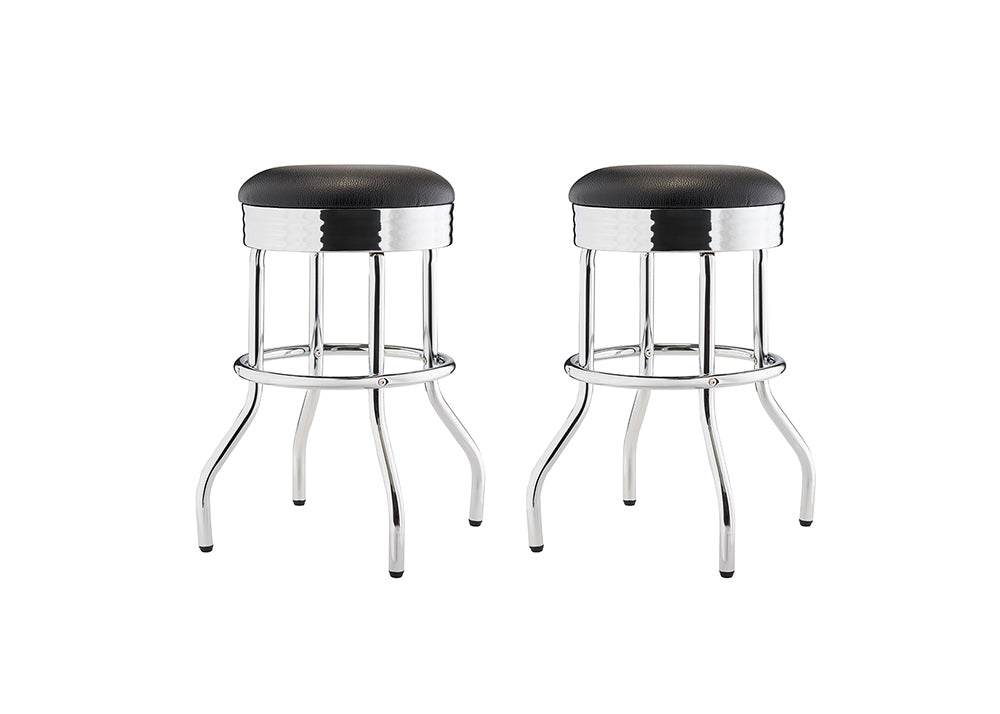 A pair of black, upholstered bar stools with chrome legs. The stools have a retro, diner-style design with circular seats and a footrest connecting the four curved legs.