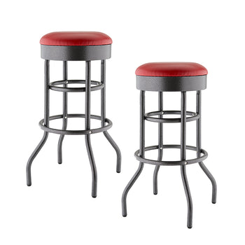 
A pair of metal bar stools are shown, one slightly taller than the other. They have black, textured metal frames with curved legs and bright red, circular padded seats.