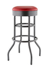 A bar stool with a black, hammered metal frame and a round, red, cushioned seat. The stool has four curved legs and two circular rungs connecting the legs, one serving as a footrest