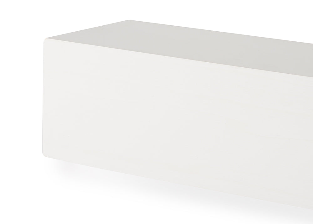 A close-up shot of a smooth, rectangular white block or floating shelf against a white background. The object features clean lines, sharp corners, and a matte finish with soft shadows underneath.