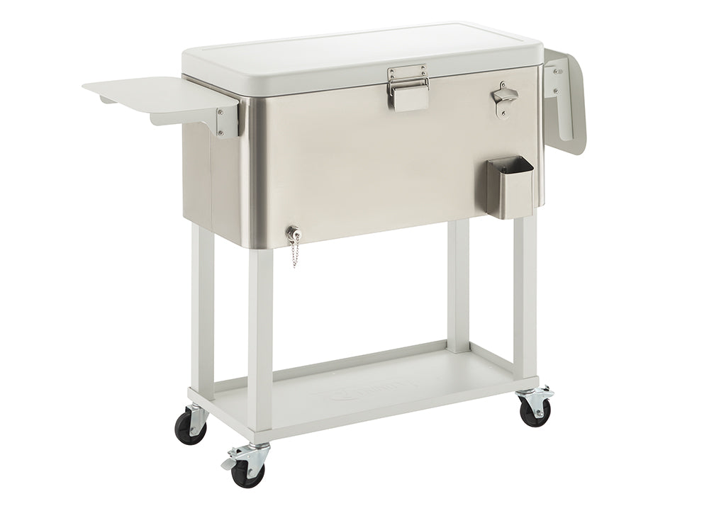 A sleek, silver outdoor cooler on a white rolling cart is presented against a white background. The cooler features a bottle opener, an attached side shelf, and a lower storage shelf on the cart.