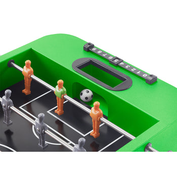 A close-up of the foosball lid of a Trinity 80 Quart Green Beverage Cooler. The foosball table features miniature players and a ball, with a scoreboard visible at the top.