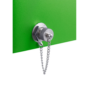 A close-up shows a green metal surface with a silver-colored threaded drain plug inserted into it. A small silver chain is attached to the plug's cap and hangs downwards.