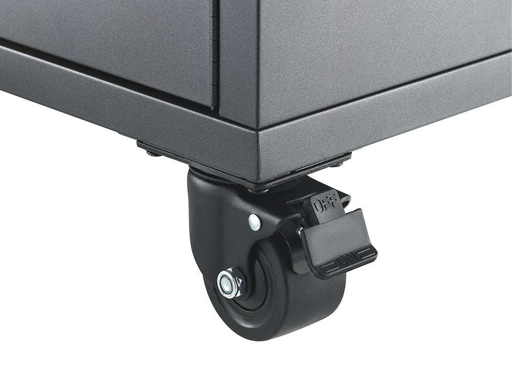 A close-up view focuses on a heavy-duty swivel caster wheel attached to the bottom corner of a dark gray steel storage cabinet. The caster features an integrated step-lock brake pedal labeled "ON" and "OFF" to easily secure the unit in place.