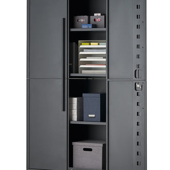 A dark gray steel storage cabinet on caster wheels is shown with one side door wide open, revealing organized office and paper supplies. The internal shelving holds small storage bins, a document paper sorter, filing boxes, and a fabric bin on a plain white background.