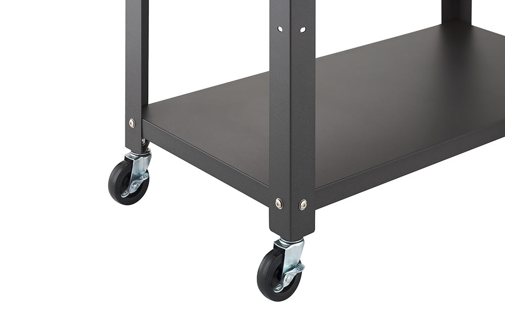 A close-up view highlights the bottom corner of a dark gray metal kitchen cart resting on a white background. The image details the lower open shelf frame secured with silver screws and two black swivel caster wheels with locking mechanisms.