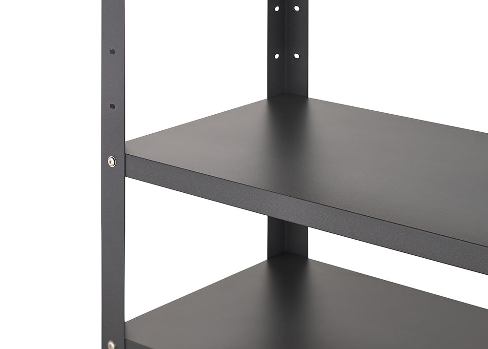 A close-up view highlights the open shelving levels of a dark gray metal kitchen cart against a white background. The image details the smooth, powder-coated shelf surfaces and the pre-drilled assembly holes on the vertical support posts.
