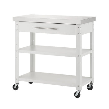 An empty white rolling kitchen cart topped with a stainless steel surface is displayed against a solid white background. It features a top storage drawer with a sleek silver handle, two lower open shelves, and four black caster wheels.