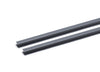 A product photo shows two parallel, dark gray H-shaped plastic or rubber extrusions resting on a white surface. These H-channels are typically used to join or seal two flat panels.