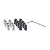A collection of silver-colored set screws with hexagonal sockets are arranged in two rows on a white surface. To the right of the screws are several black, rounded protective caps and a silver L-shaped hexagonal wrench.