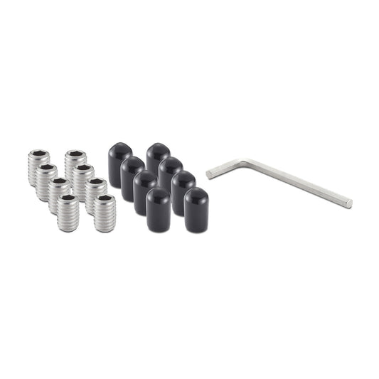 A collection of silver-colored set screws with hexagonal sockets are arranged in two rows on a white surface. To the right of the screws are several black, rounded protective caps and a silver L-shaped hexagonal wrench.