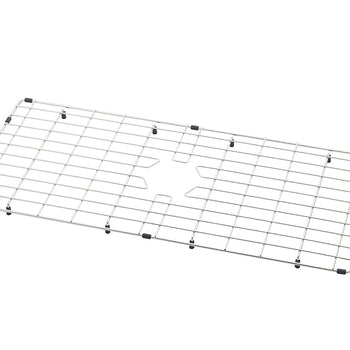 A rectangular stainless steel sink grid is positioned horizontally against a plain white background. It features a cross-patterned wire mesh design with a central cutout for a drain and small black protective rubber feet along the edges and bottom.