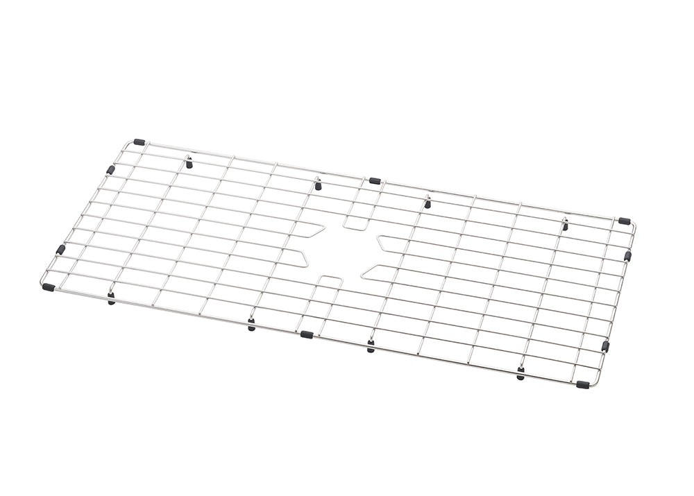A rectangular stainless steel sink grid is positioned horizontally against a plain white background. It features a cross-patterned wire mesh design with a central cutout for a drain and small black protective rubber feet along the edges and bottom.