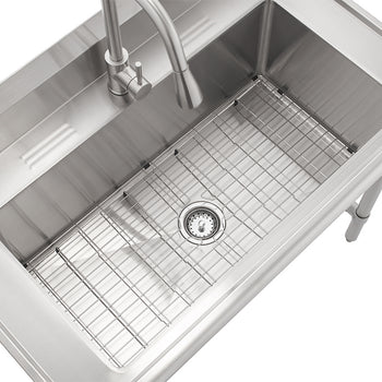 A high-angle, close-up shot of a rectangular stainless steel utility sink featuring a pull-down faucet and a wire bottom grid. The sink has a brushed metal finish and is shown against a plain white background.