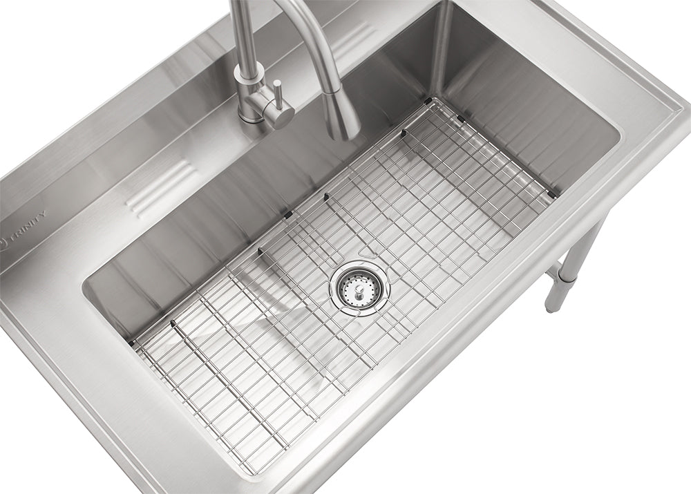 A high-angle, close-up shot of a rectangular stainless steel utility sink featuring a pull-down faucet and a wire bottom grid. The sink has a brushed metal finish and is shown against a plain white background.