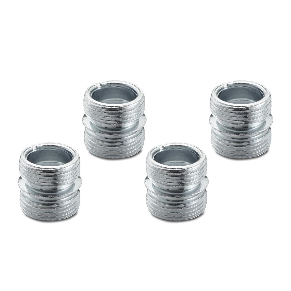 Four silver-colored, cylindrical metal screw inserts are arranged on a white background. Each insert features external threading along its sides and a smooth, hollow interior.