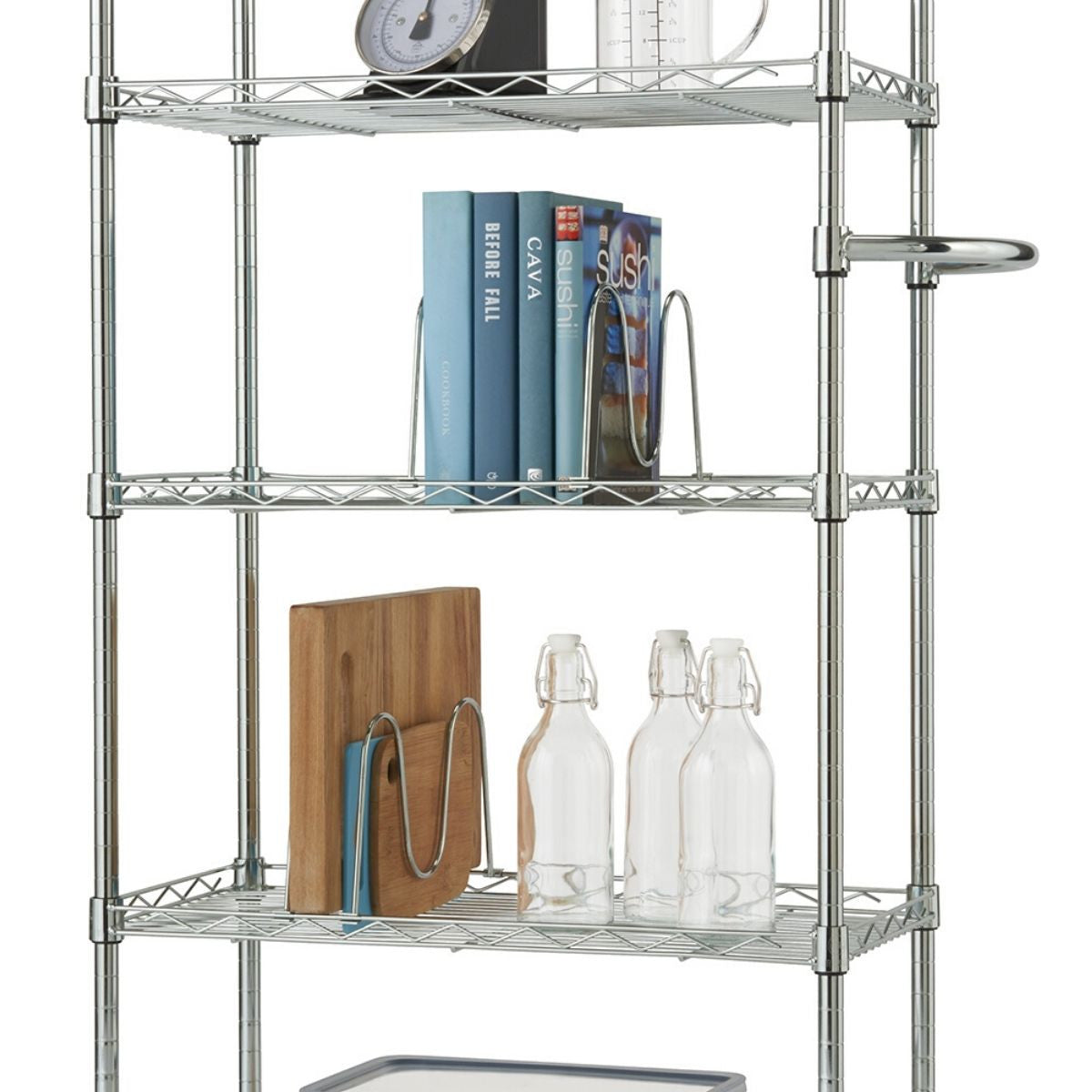 A close-up shows a four-tiered wire shelving unit against a white background. The shelves hold various kitchen and household items, including books, bottles, and cutting boards which are separated by w-shape chrome dividers.