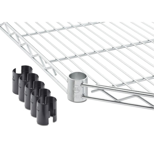 A close-up shows a section of a corner chrome wire shelf with its support pole and several black plastic clips. The chrome pole has the word "TRINITY" embossed on its side.