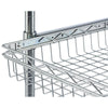 A close-up shot shows a chrome wire pull-out basket with a sliding mechanism, attached to a vertical pole on the left. The basket, designed for storage, is seen from a slightly elevated angle, highlighting its grid pattern and the sturdy metal construction of the slider.