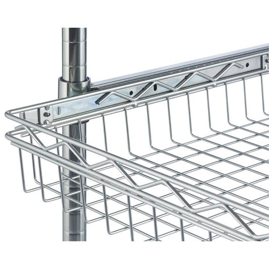 A close-up shot shows a chrome wire pull-out basket with a sliding mechanism, attached to a vertical pole on the left. The basket, designed for storage, is seen from a slightly elevated angle, highlighting its grid pattern and the sturdy metal construction of the slider.